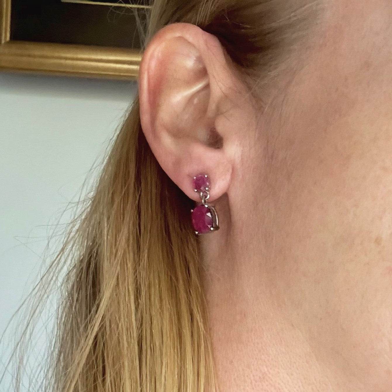 Ruby drop earrings in white gold plated sterling silver with natural pink rubies.