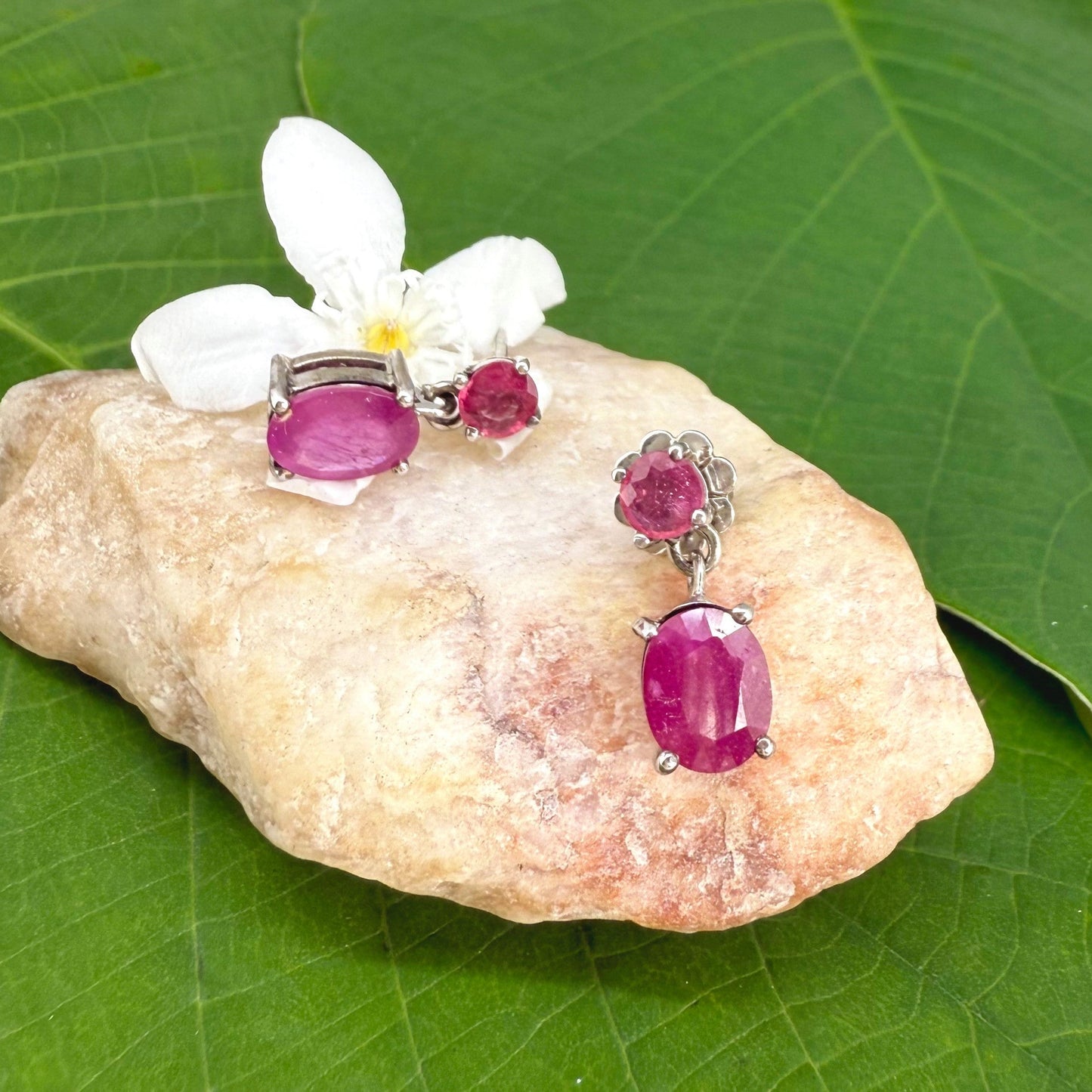 Ruby drop earrings in white gold plated sterling silver with natural pink rubies.