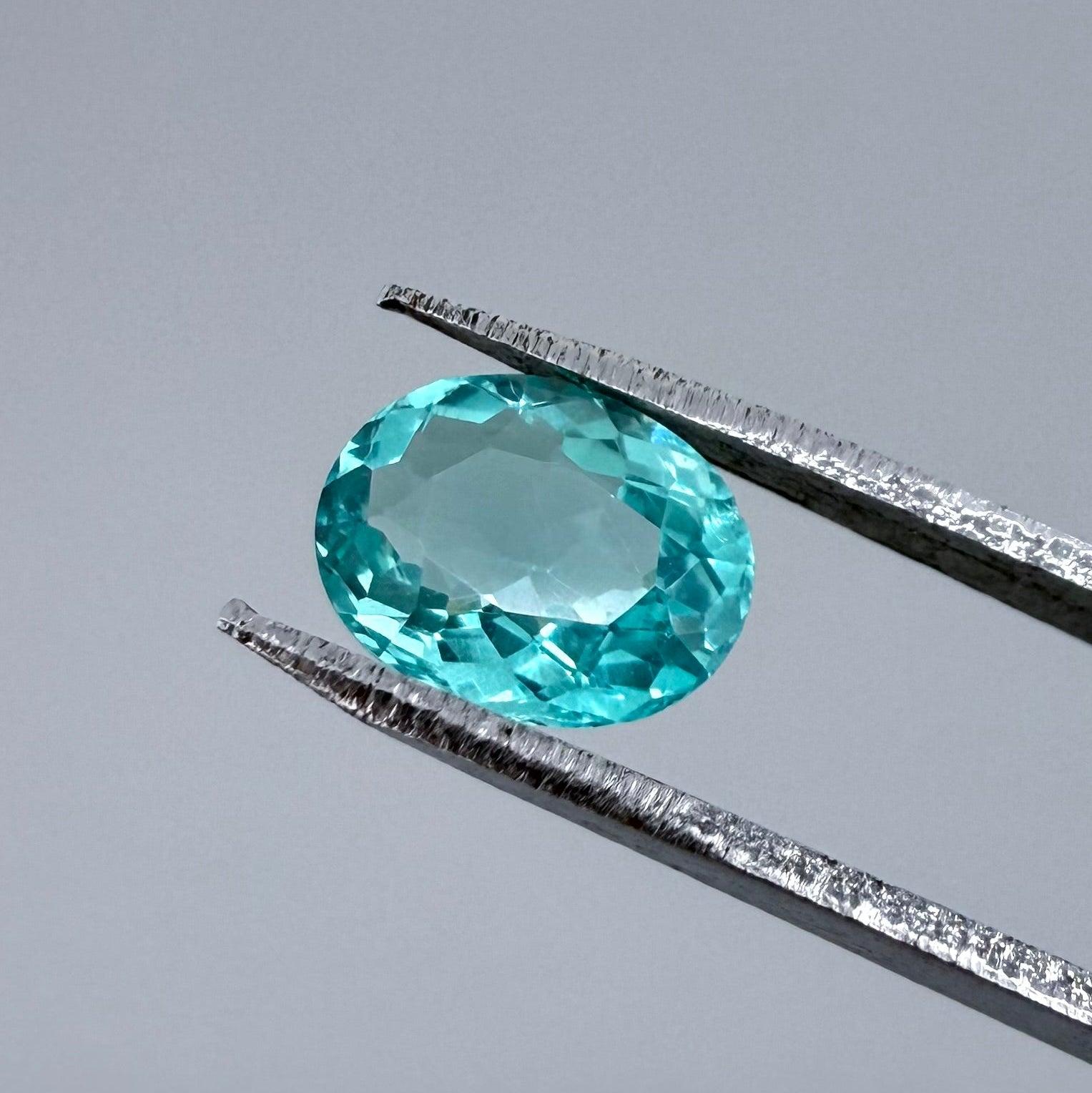 Loose Vibrant Turquoise Apatite gemstone, oval cut
