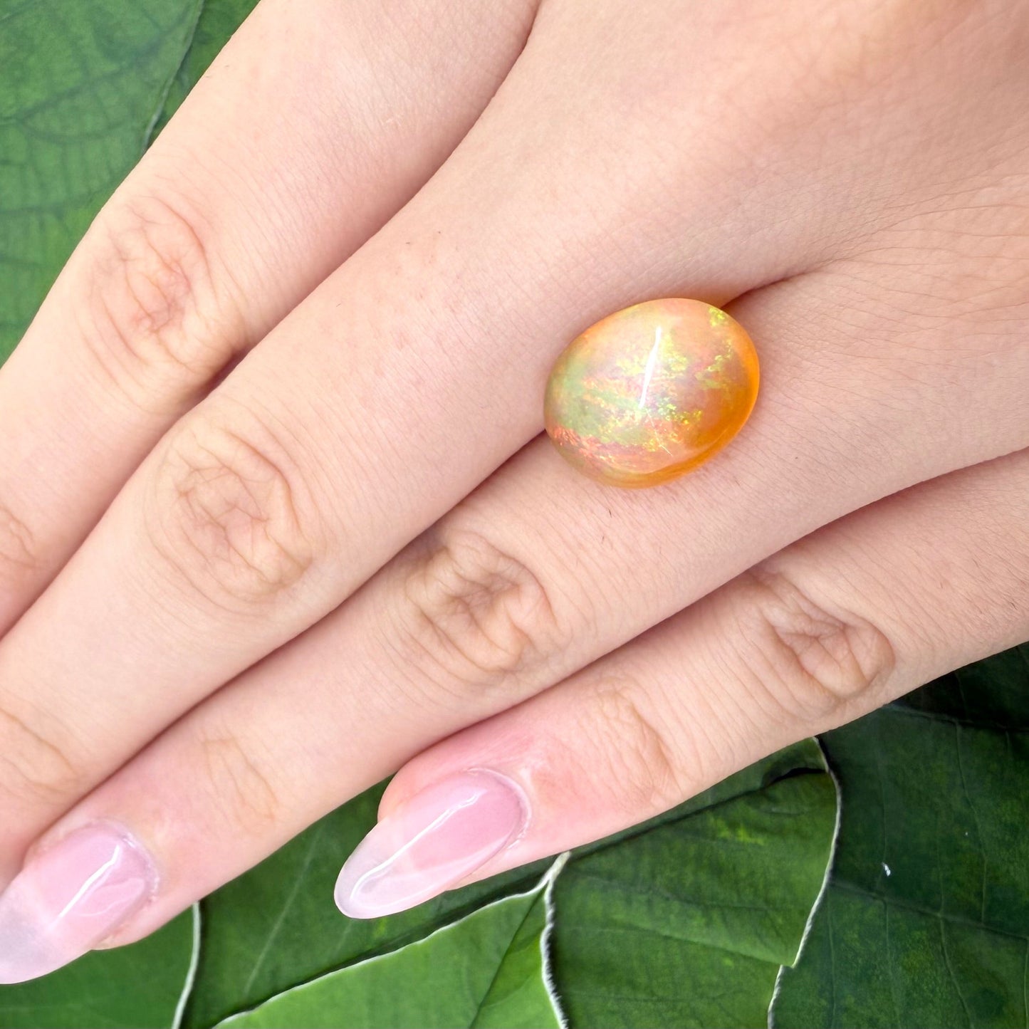 Natural Play-of-Color Fire Opal gemstone, cabochon cut