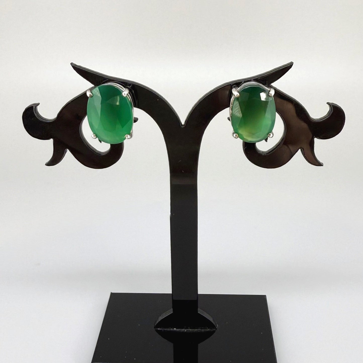 Green agate stud earrings in white gold plated sterling silver with butterfly backs.