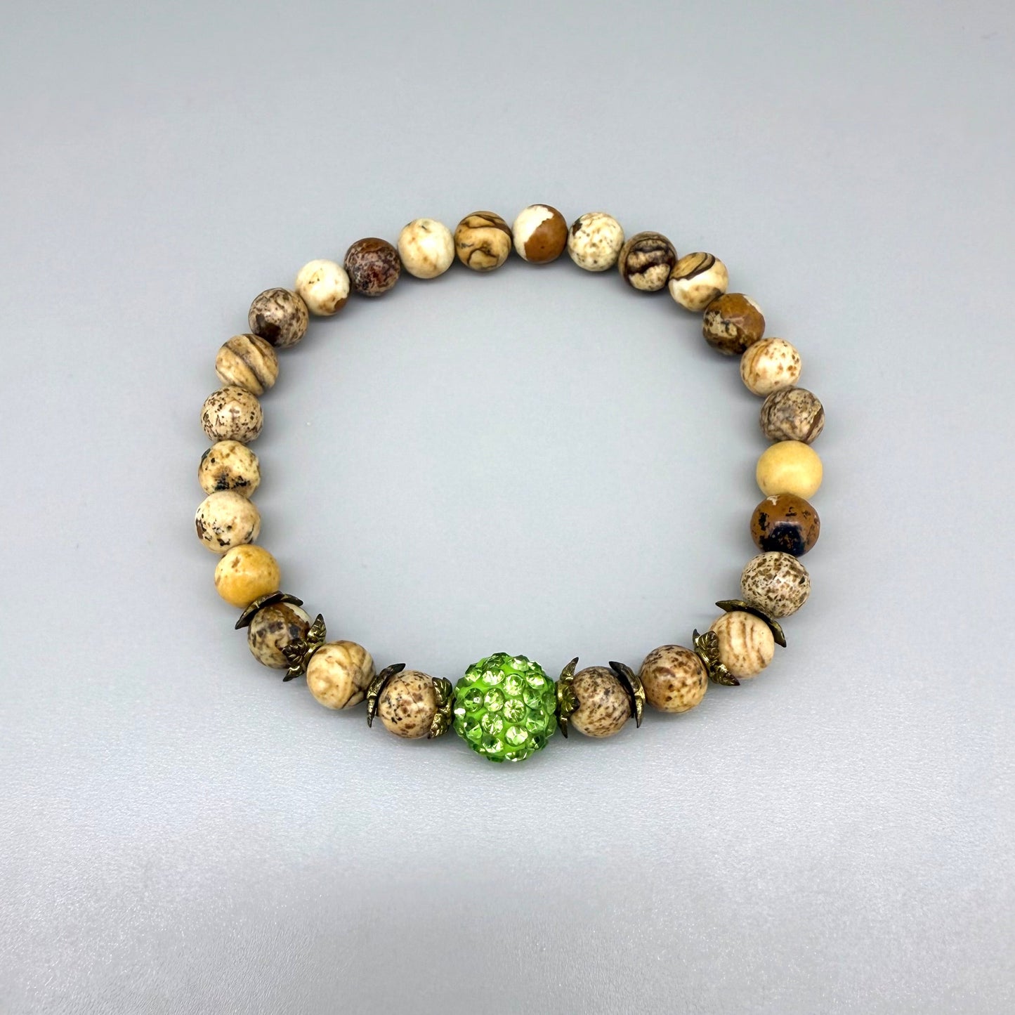 Jasper beaded bracelet, natural gemstone beads in light earthy tones on elastic stretch band.