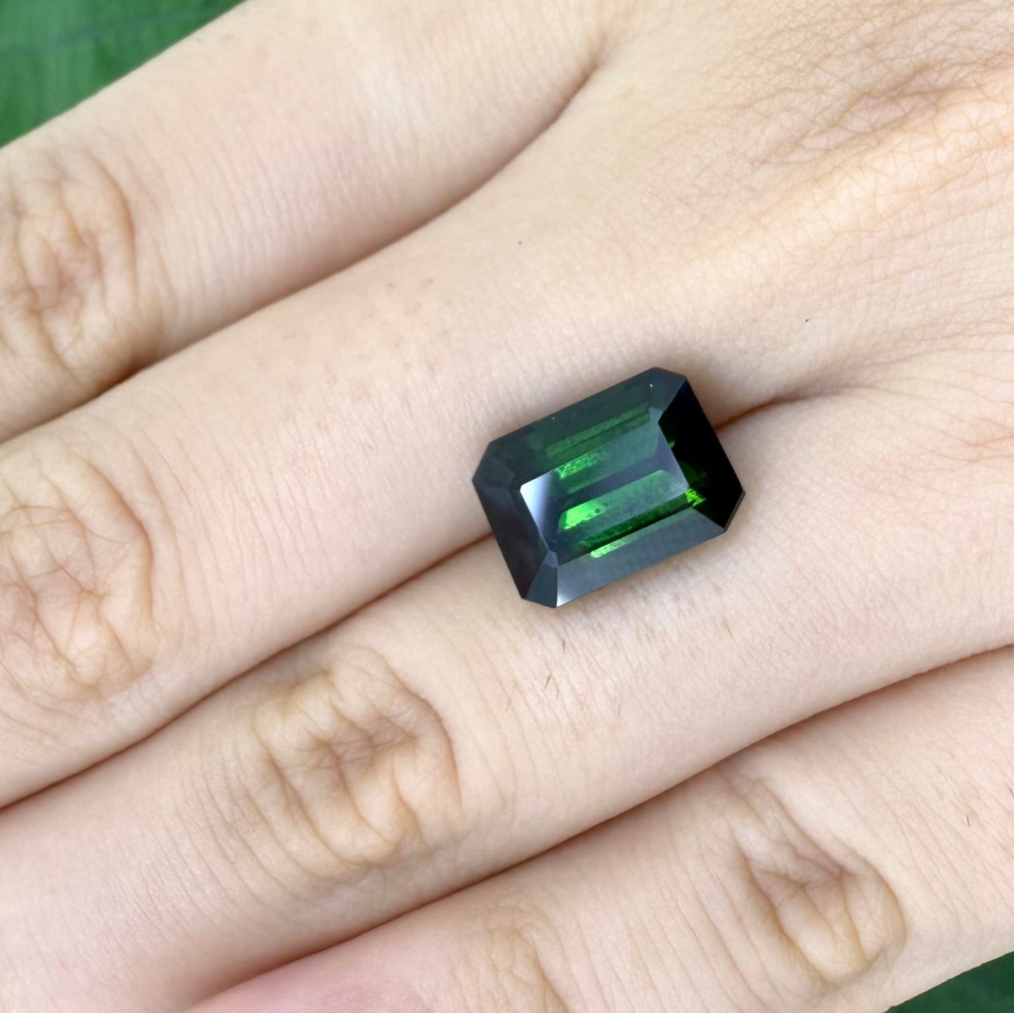 Loose Green Tourmaline gemstone, emerald cut