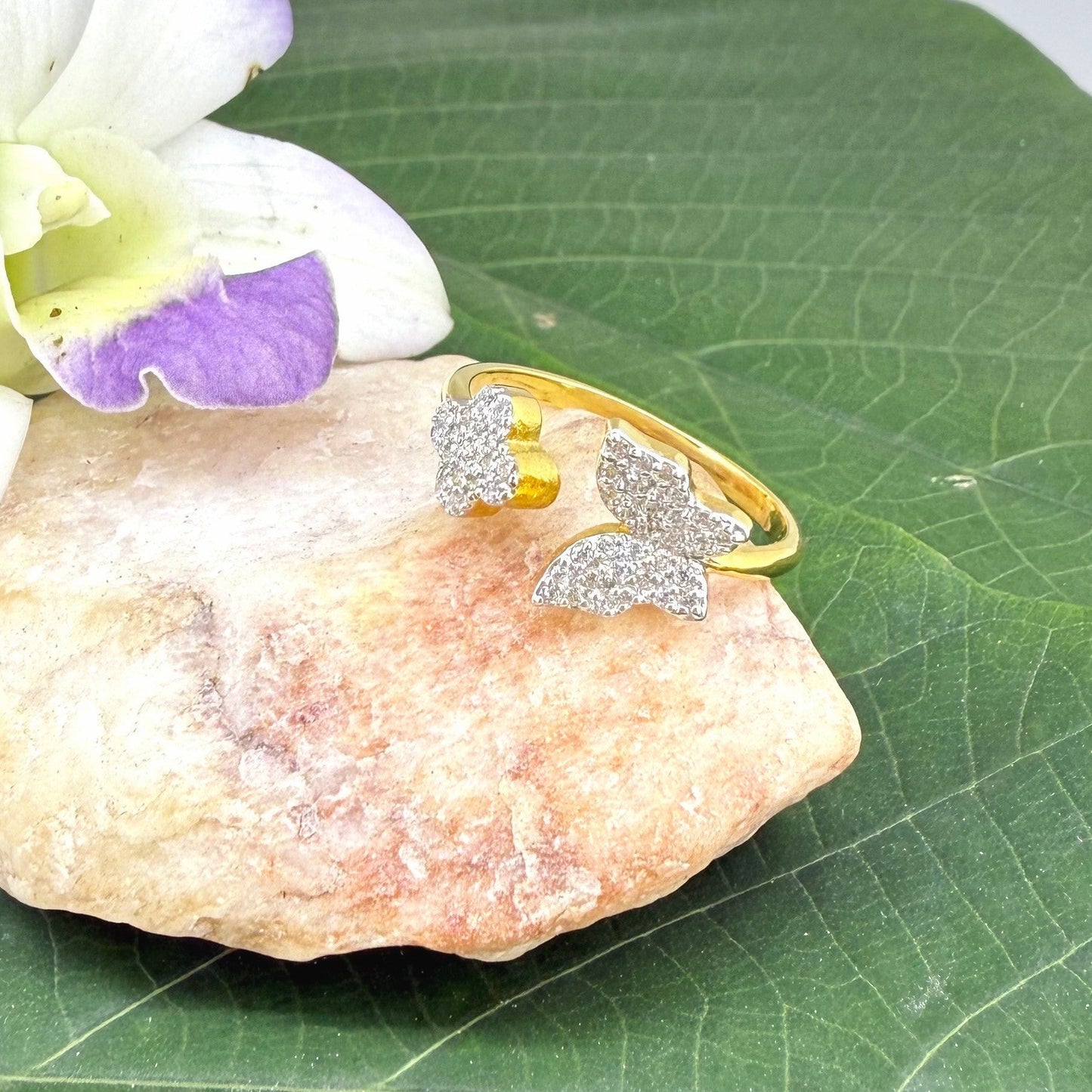 23k gold butterfly and flower ring with 47 cubic zirconia in open design, size 57.