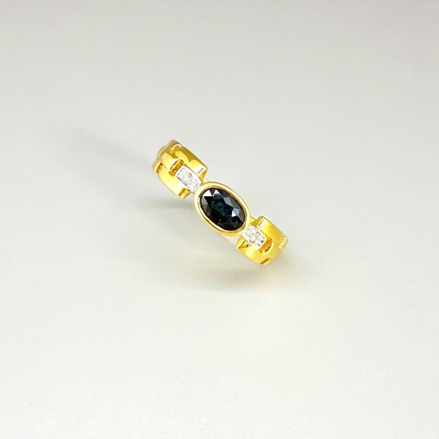 23k gold ring with 0.49 ct Laos sapphire and diamonds, deep blue gemstone in elegant classic setting, size 52.