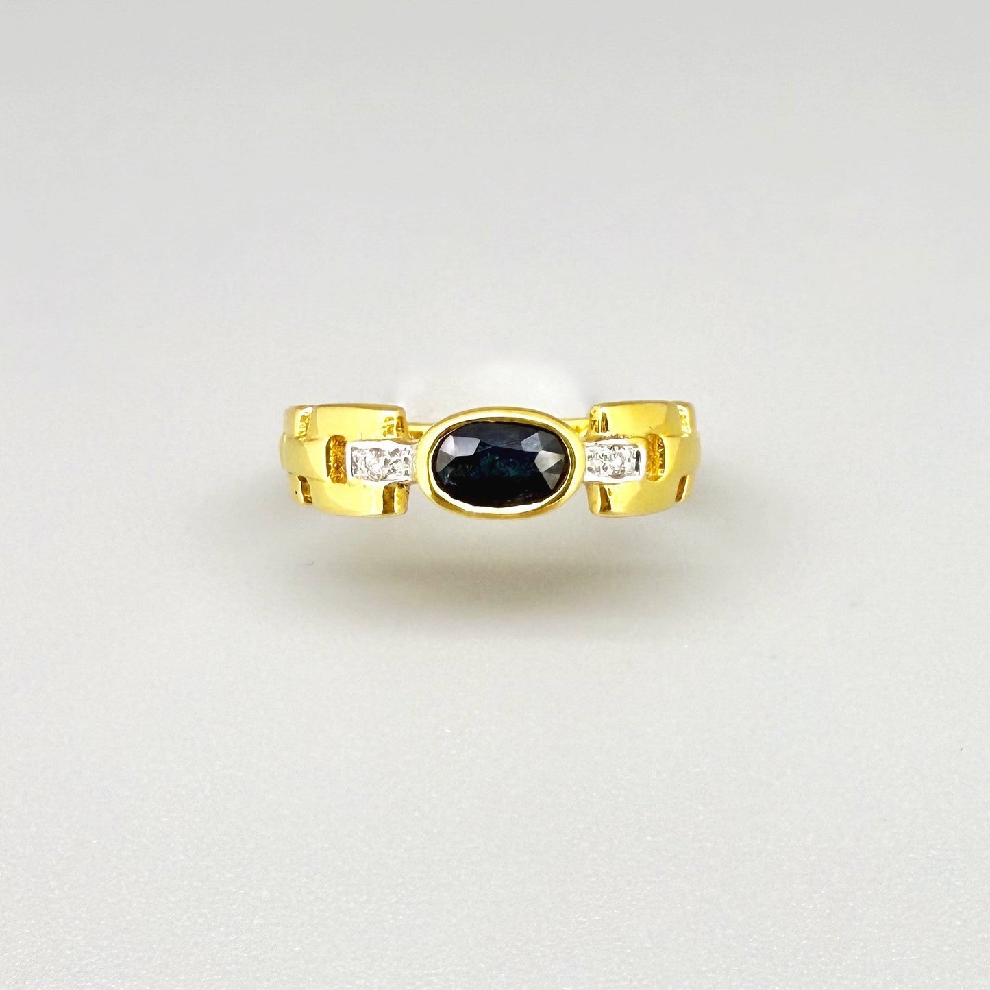 23k gold ring with 0.49 ct Laos sapphire and diamonds, deep blue gemstone in elegant classic setting, size 52.
