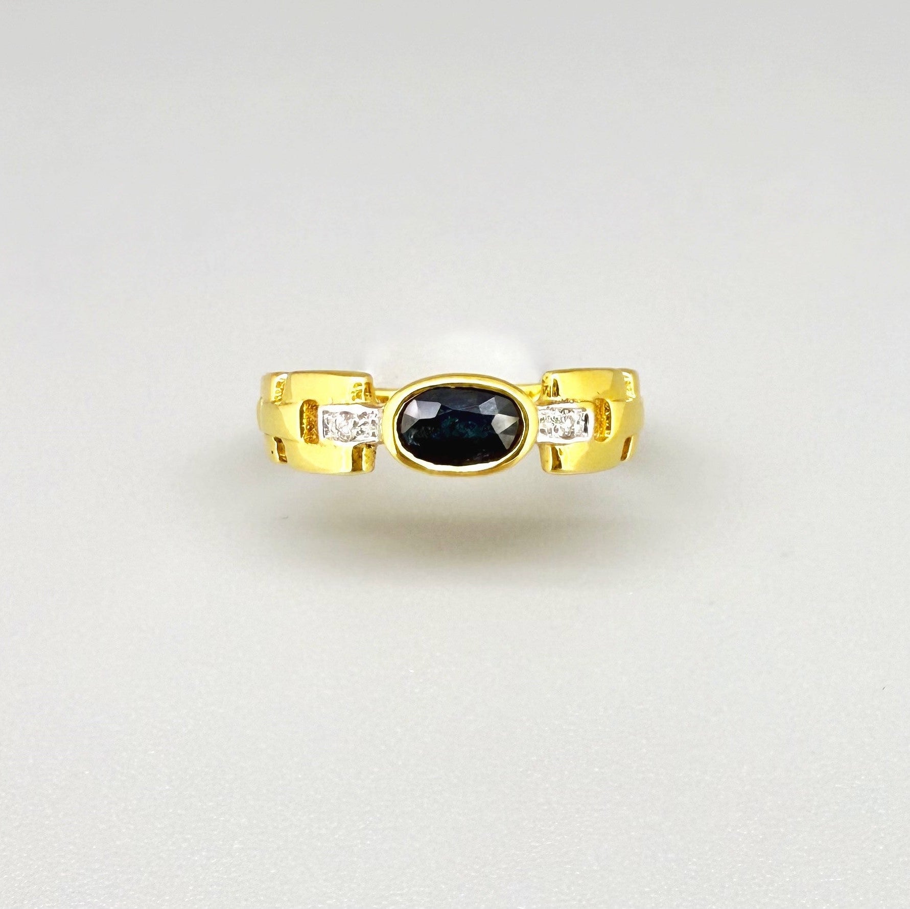 23k gold ring with 0.49 ct Laos sapphire and diamonds, deep blue gemstone in elegant classic setting, size 52.