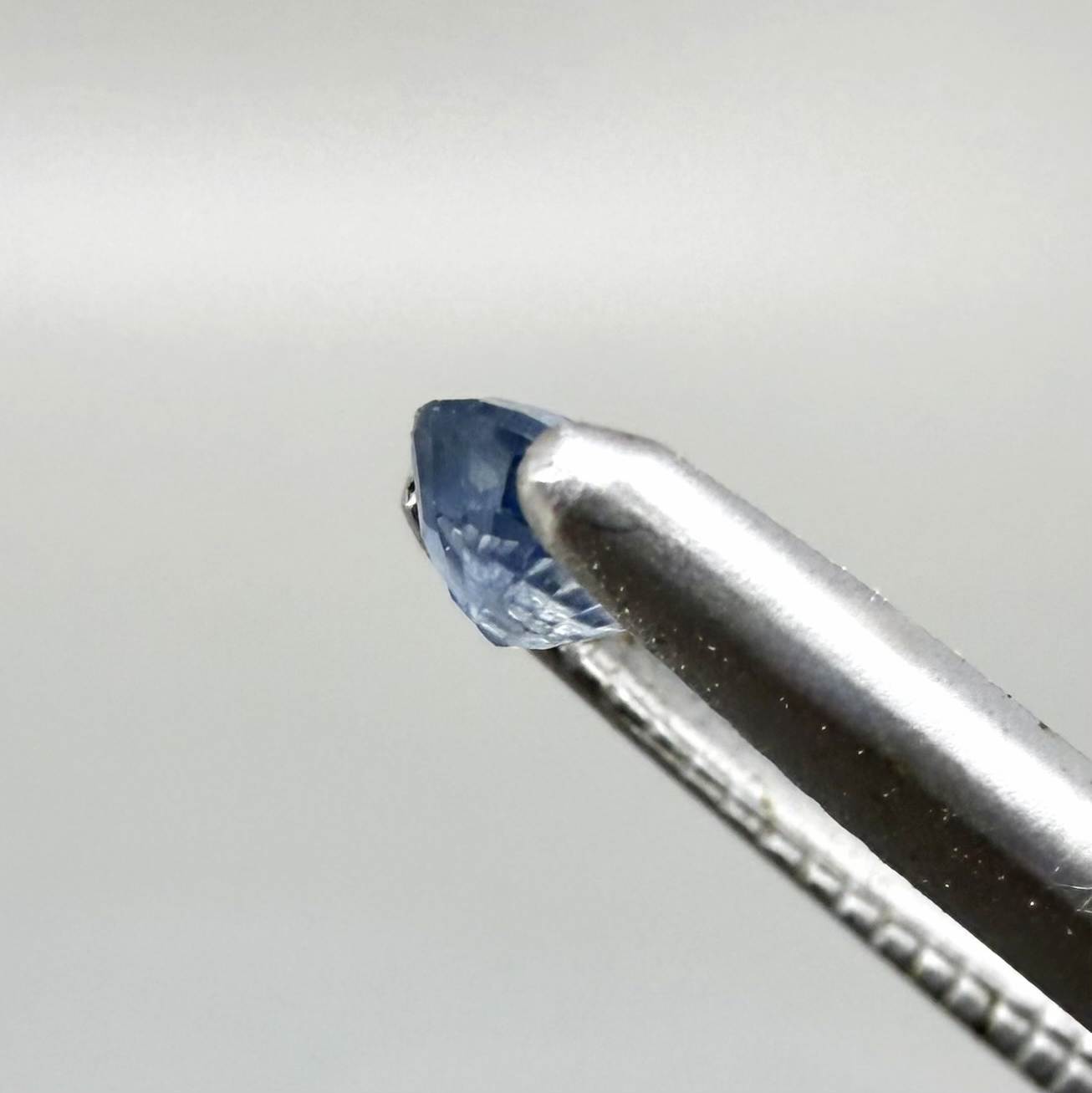 Oval-cut soft cornflower blue sapphire from Bangkaja, Thailand, natural faceted gemstone.