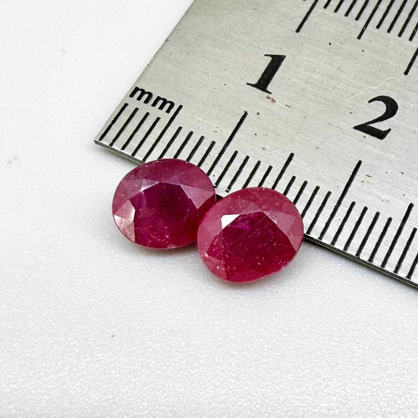 Natural Ruby Pair 4.18 ct from Mozambique – matching oval faceted pinkish-red gemstones