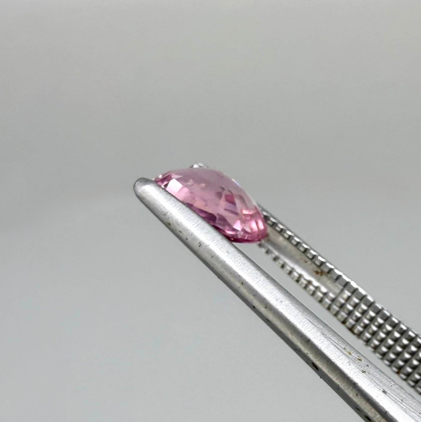 Natural untreated pink tourmaline, 0.95 ct oval cut from Nigeria with bright pink colour, eye-clean clarity and excellent brilliance.