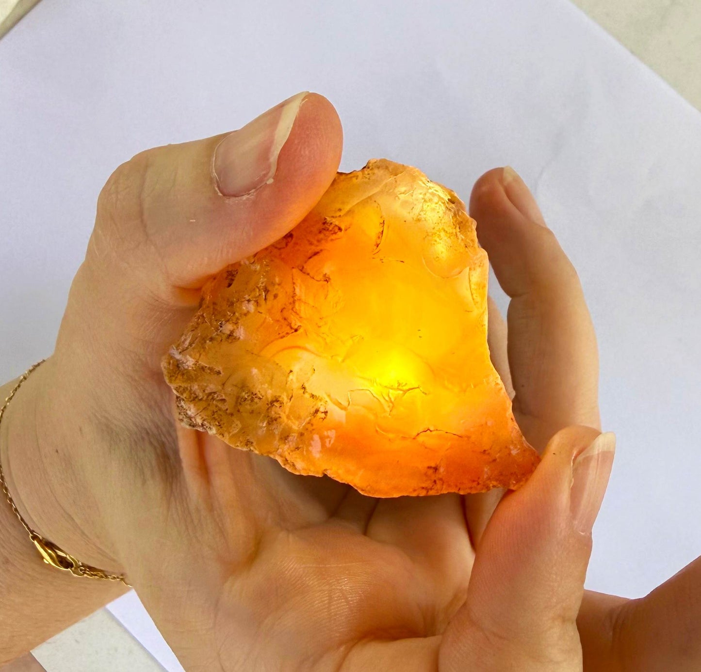 Rough and uncut chalcedony/carnelian lot in natural red-orange tones, untreated raw gemstones.