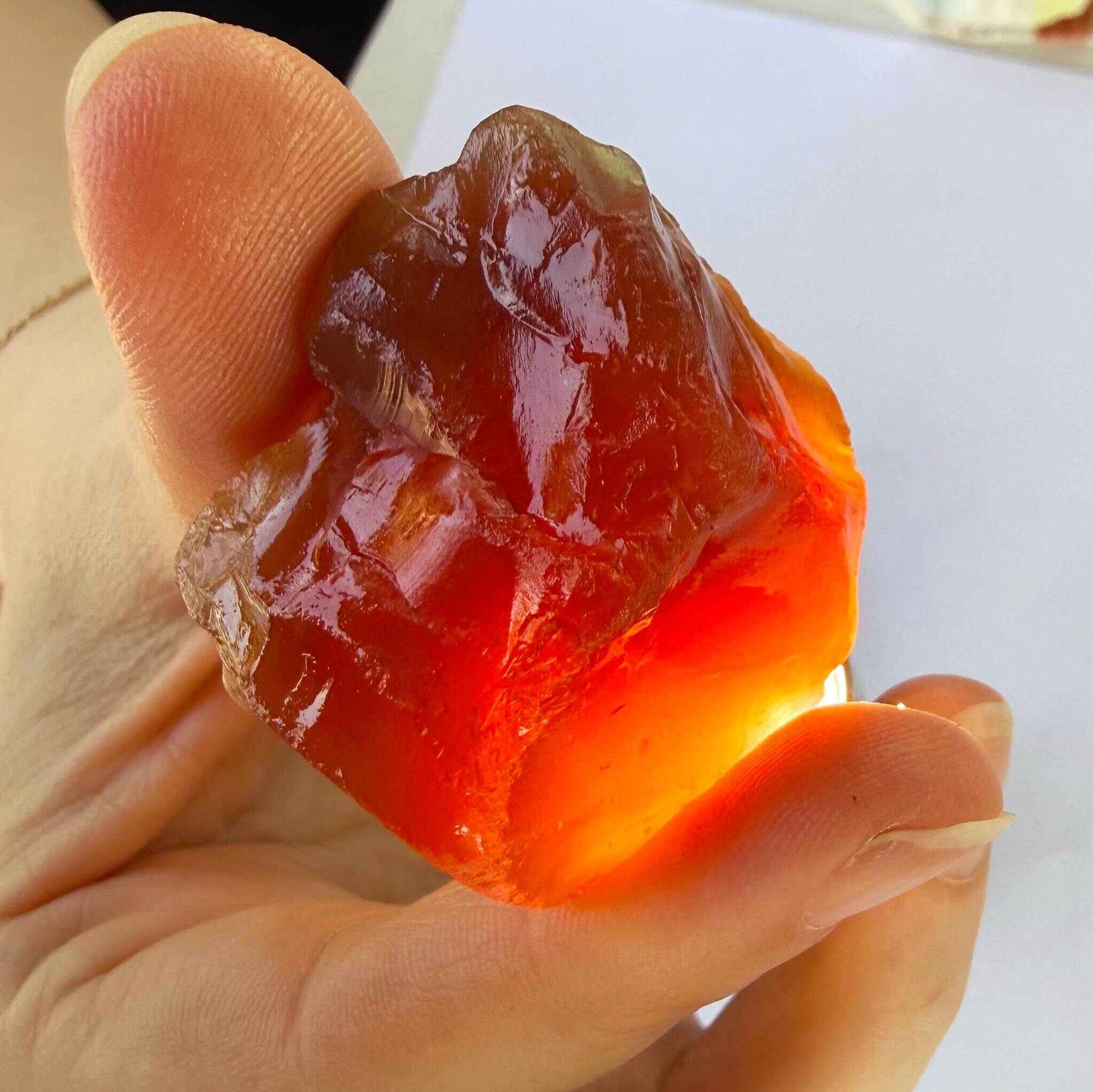 Natural Rough and uncut chalcedony carnelian lot in natural red-orange tones, untreated raw gemstones.