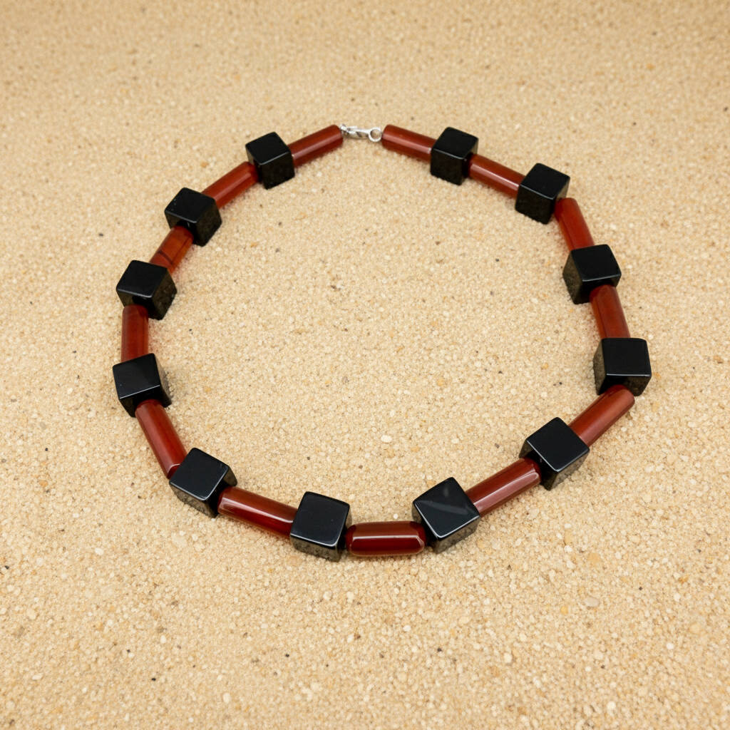 Handcrafted red agate and black cube-bead necklace, geometric design, 43 cm.