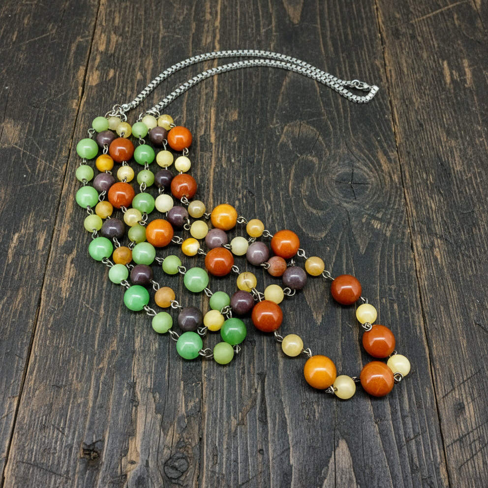 Double-strand necklace with jade and aventurine beads in green, yellow and brown tones, 70 cm.