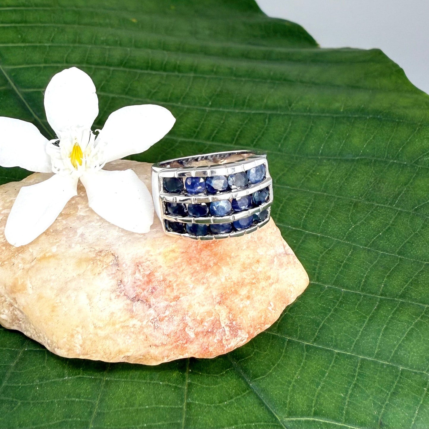 Sapphire band ring in white gold plated sterling silver, featuring three rows of natural deep blue gemstones, elegant and timeless design.
