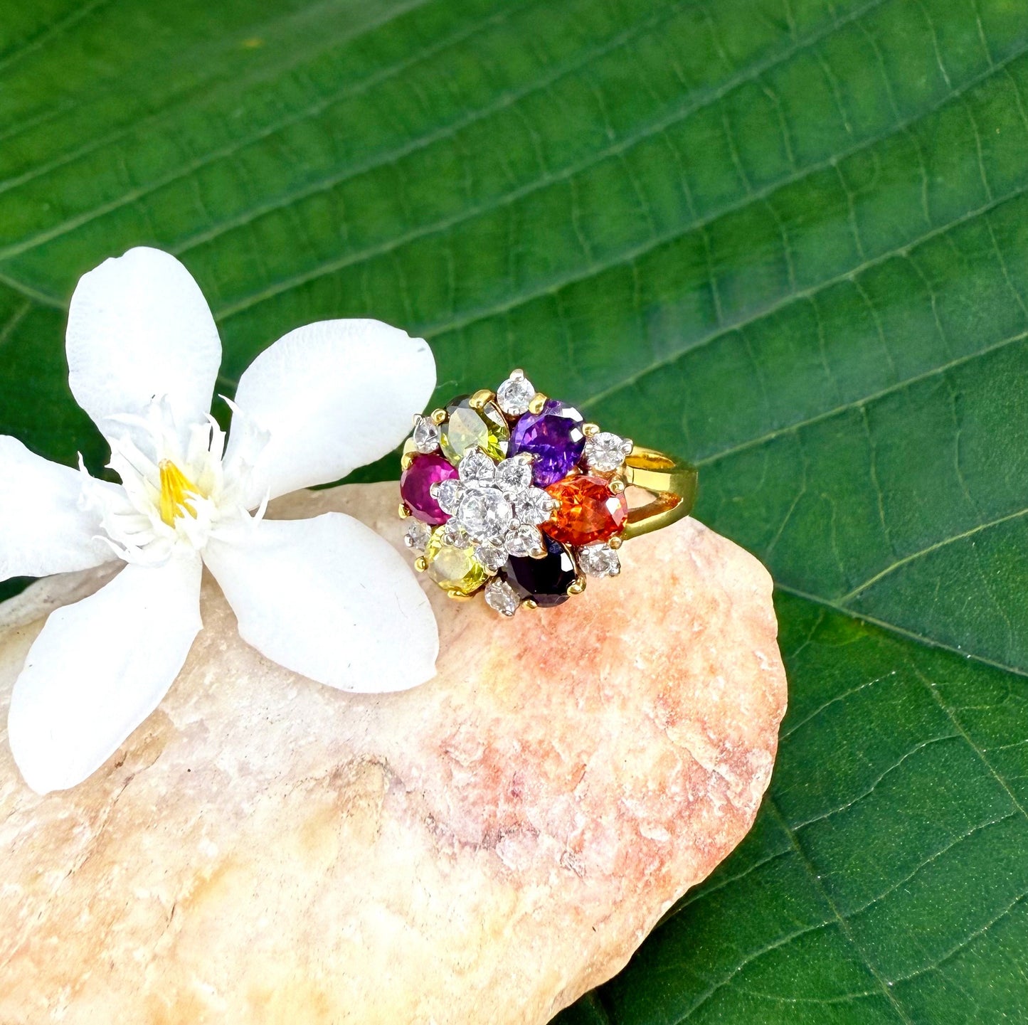 Tourmaline cluster ring in gold plated sterling silver, featuring faceted pink, green, and yellow gemstones, elegant and colorful design.