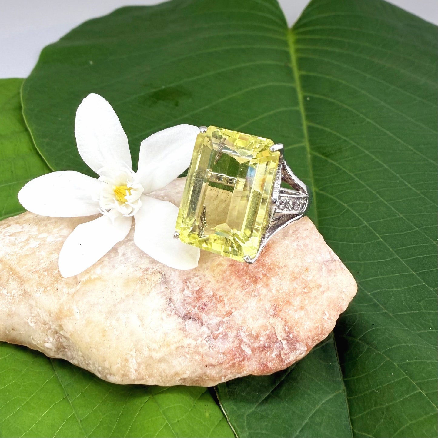 Chrysoprase and CZ ring in white gold plated sterling silver, featuring a rectangular bright green gemstone with clear cubic zirconia side accents, elegant and modern design.