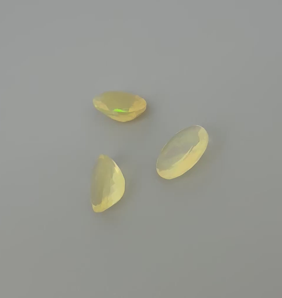 Natural Milky Yellow play-of-color Opal gemstone set, oval cut
