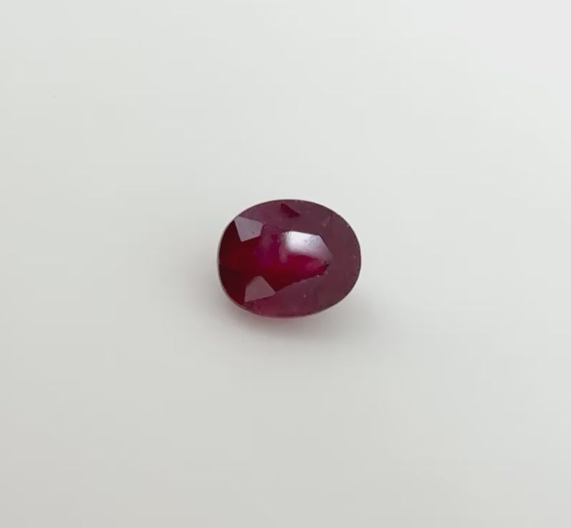 Natural Purplish Red Ruby gemstone, oval cut