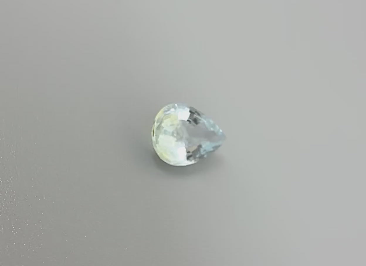 Natural Pale Blue, Yellow, and White Aquamarine gemstone, pear cut