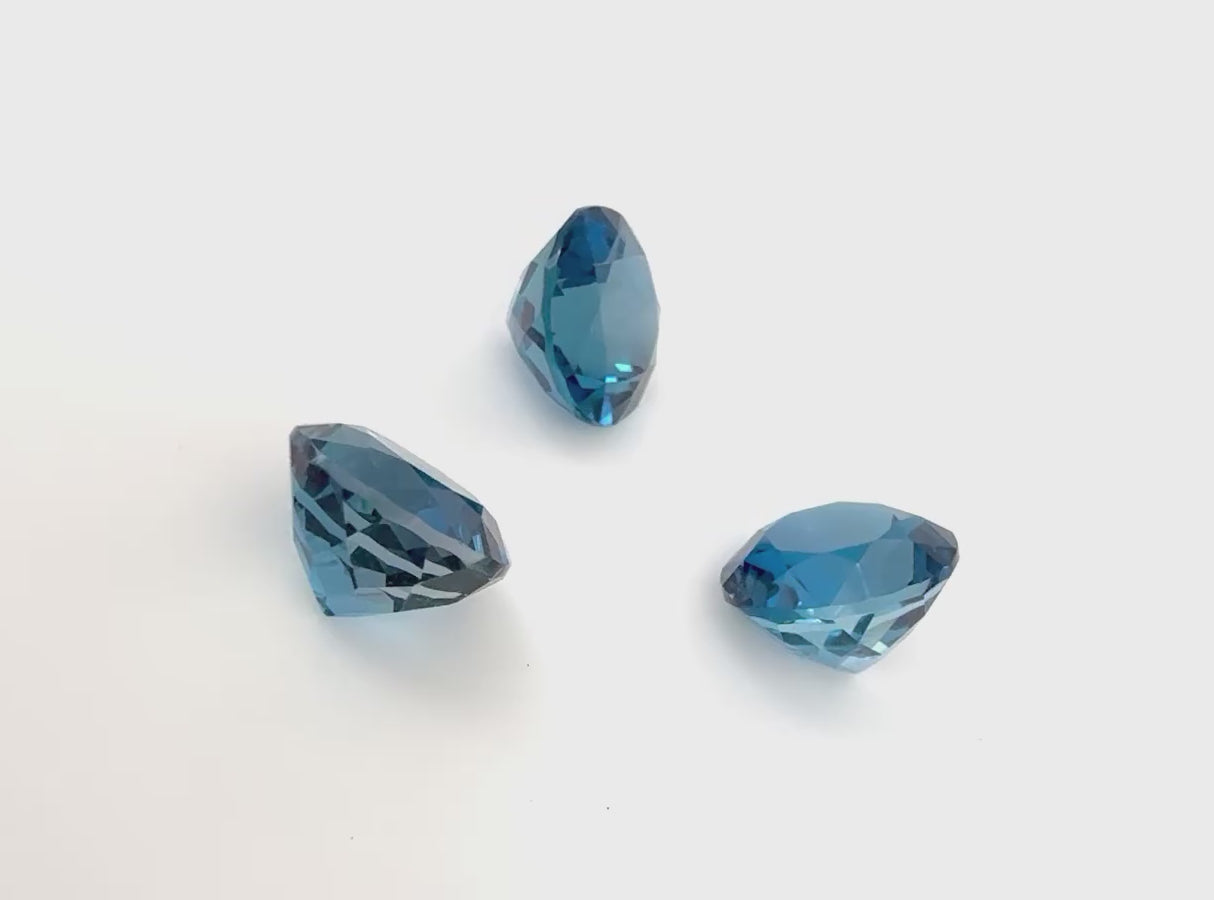 Loose London Blue Topaz gemstone set, round