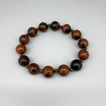 Mahogany obsidian beaded bracelet, 17cm, natural brown and black gemstone beads with small copper accents on elastic stretch band.