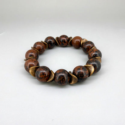 Mahogany obsidian beaded bracelet, 17cm, natural brown and black gemstone beads with copper-colored spacer accents on elastic stretch band.