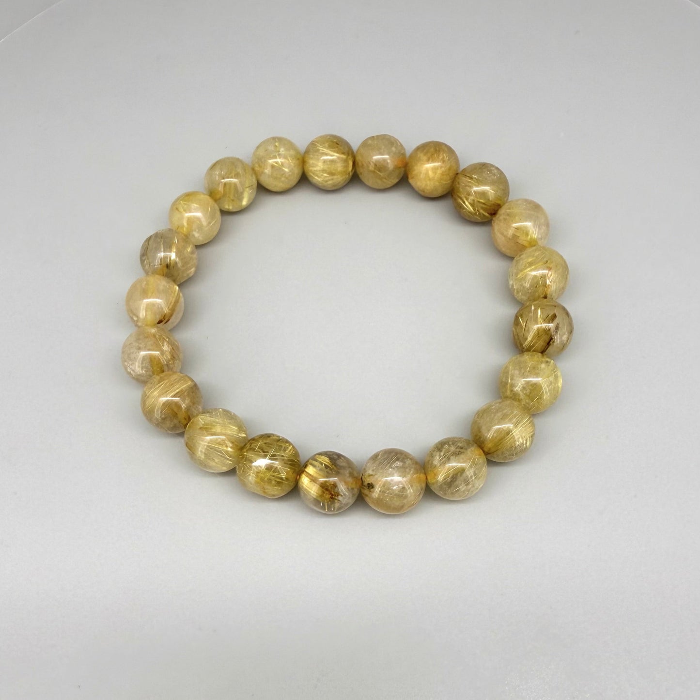 Rutilated quartz beaded bracelet, natural gemstone beads with golden rutile threads on elastic stretch band
