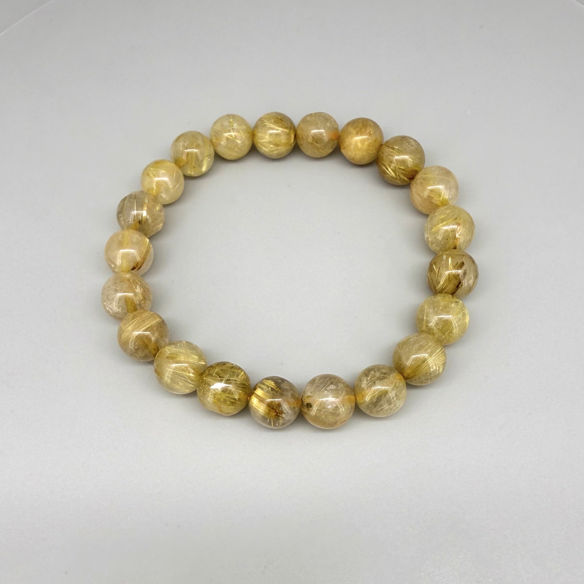 Rutilated quartz beaded bracelet, natural gemstone beads with golden rutile threads on elastic stretch band