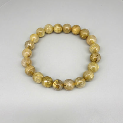 Rutilated quartz beaded bracelet, natural gemstone beads with golden rutile threads on elastic stretch band