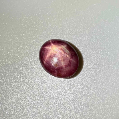 9.4 ct natural Bordeaux-Red Star Ruby cabochon from Mozambique with soft star effect and polished dome