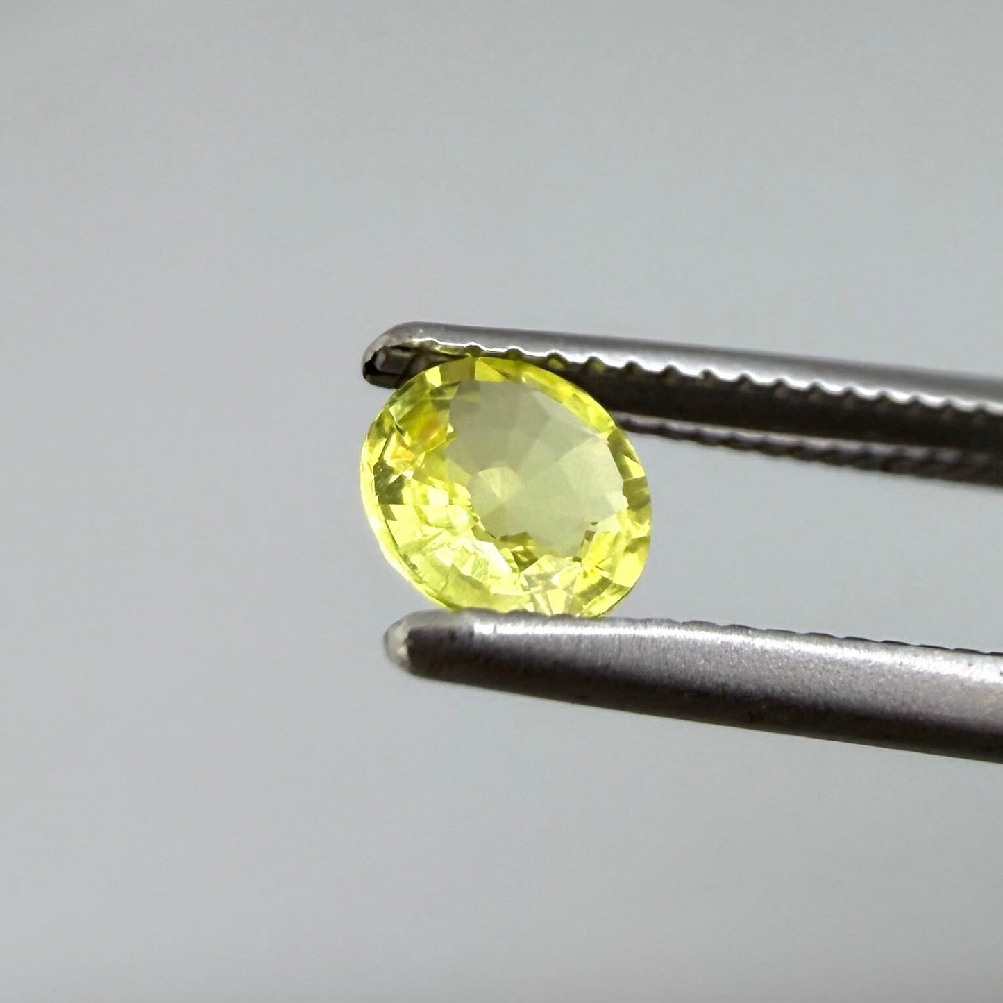 0.28 ct natural yellow sapphire from Bangkaja, round cut.