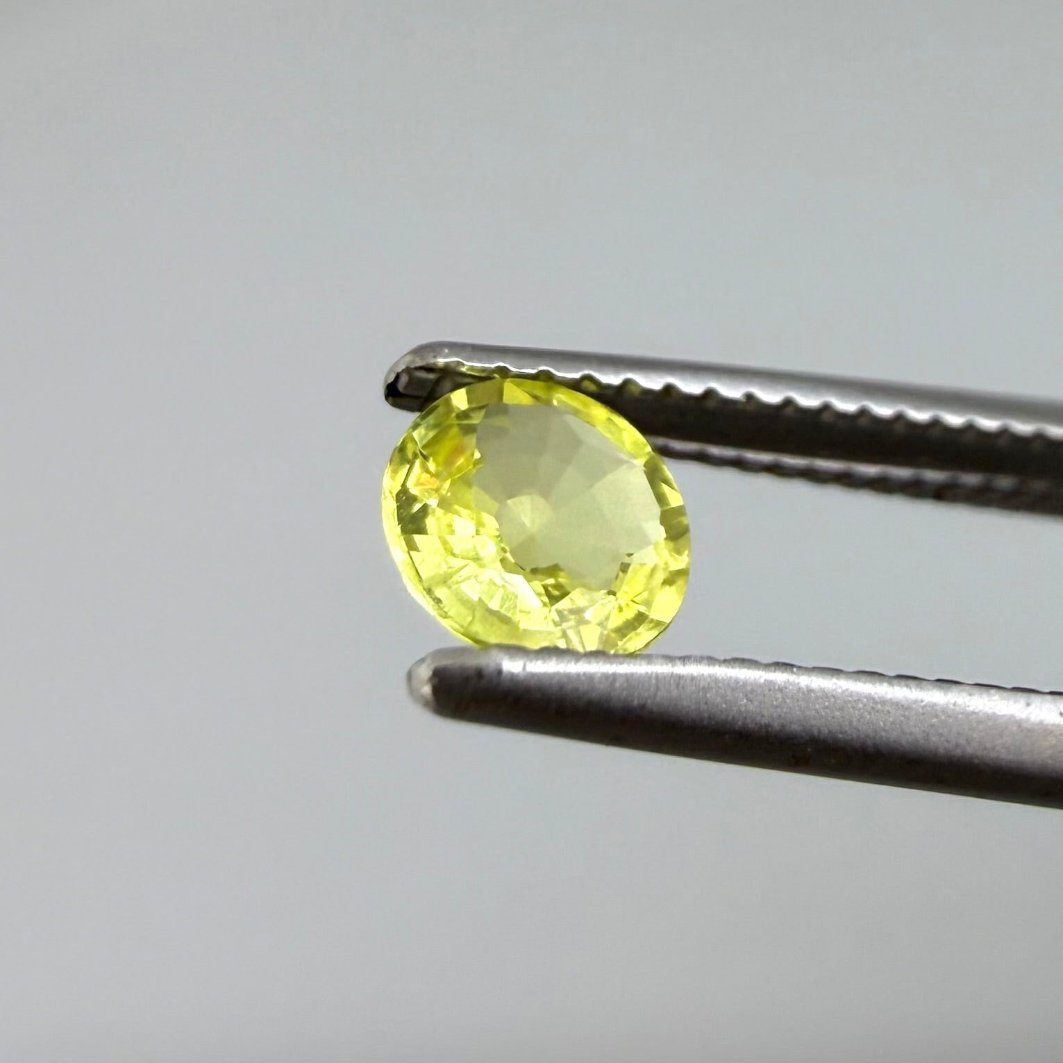 0.28 ct natural yellow sapphire from Bangkaja, round cut.