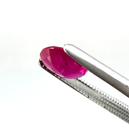 0.87 ct natural pink-red Songea ruby, oval cut.