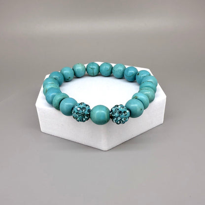 Howlite beaded bracelet, 18cm, white gemstone beads with grey veining and two sparkling accent beads on elastic stretch band.