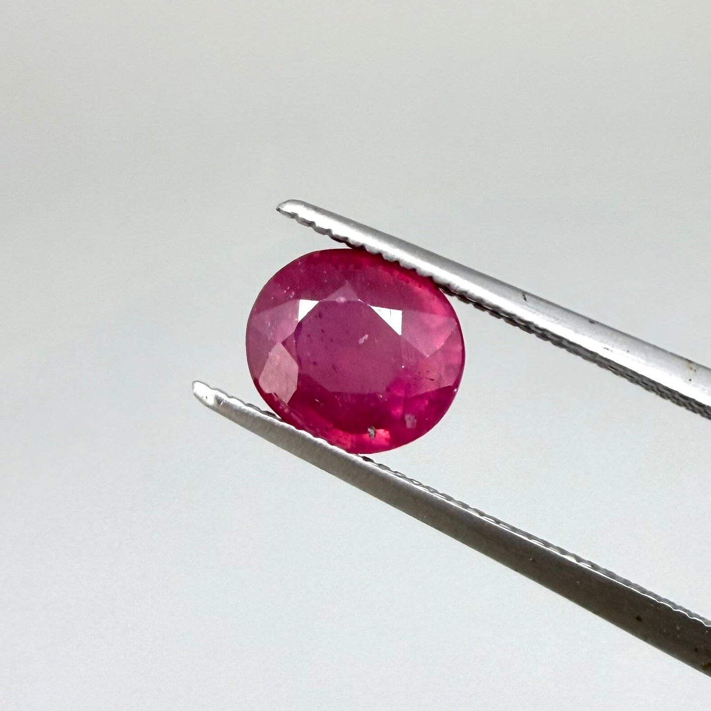 2.1 ct natural pink-red Songea ruby, oval cut.