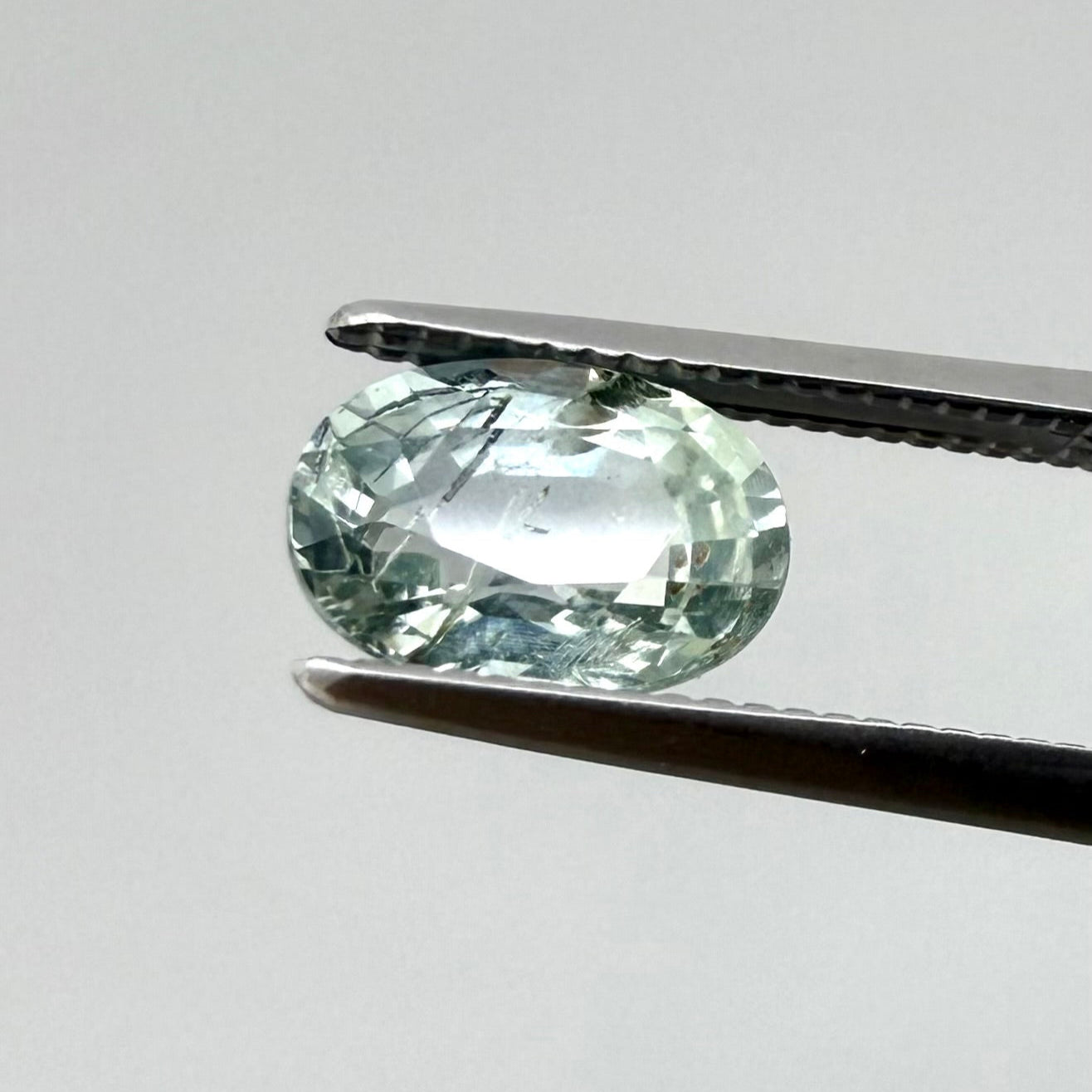 Bi-Color (Pale Green Pale Blue) Sapphire Oval 1.2 Ct