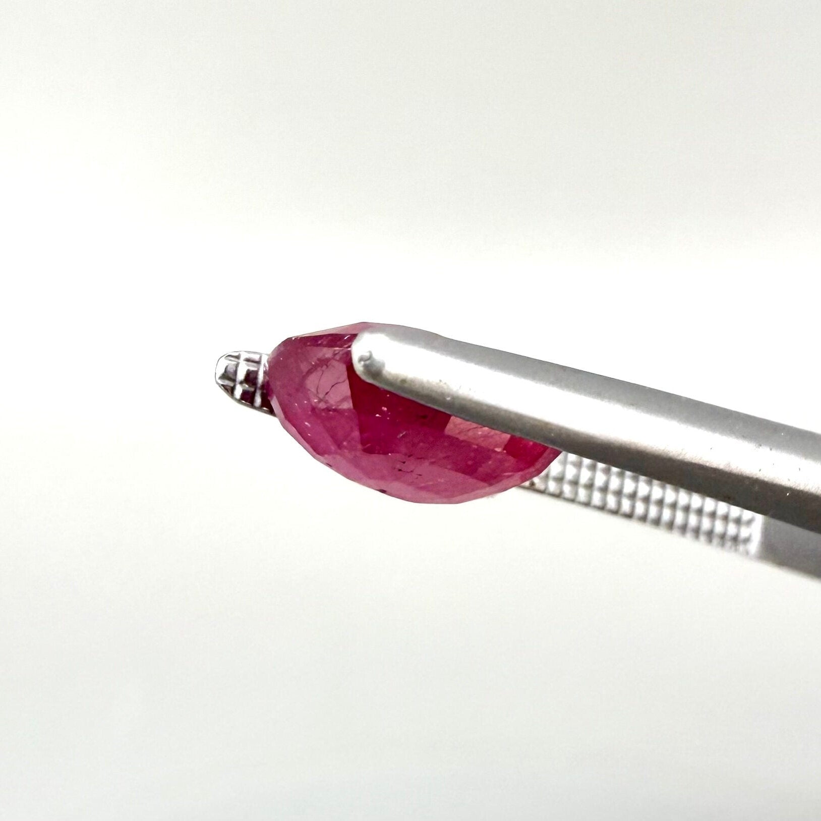 2.2 ct natural pink-red Mozambique ruby, oval cut.