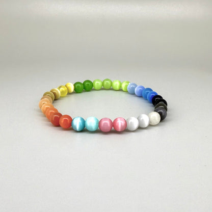 Cat’s Eye multicolor beaded bracelet, 18cm, natural gemstone beads with shimmering light effect on elastic stretch band.