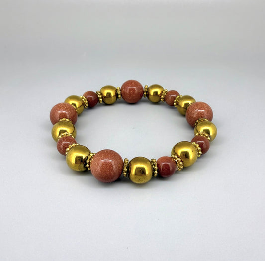 Hematite and goldstone beaded bracelet, 18cm, metallic gold and shimmering golden-copper beads on elastic stretch band.