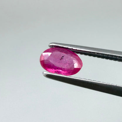 0.32 ct natural pink-red Songea ruby, oval cut.