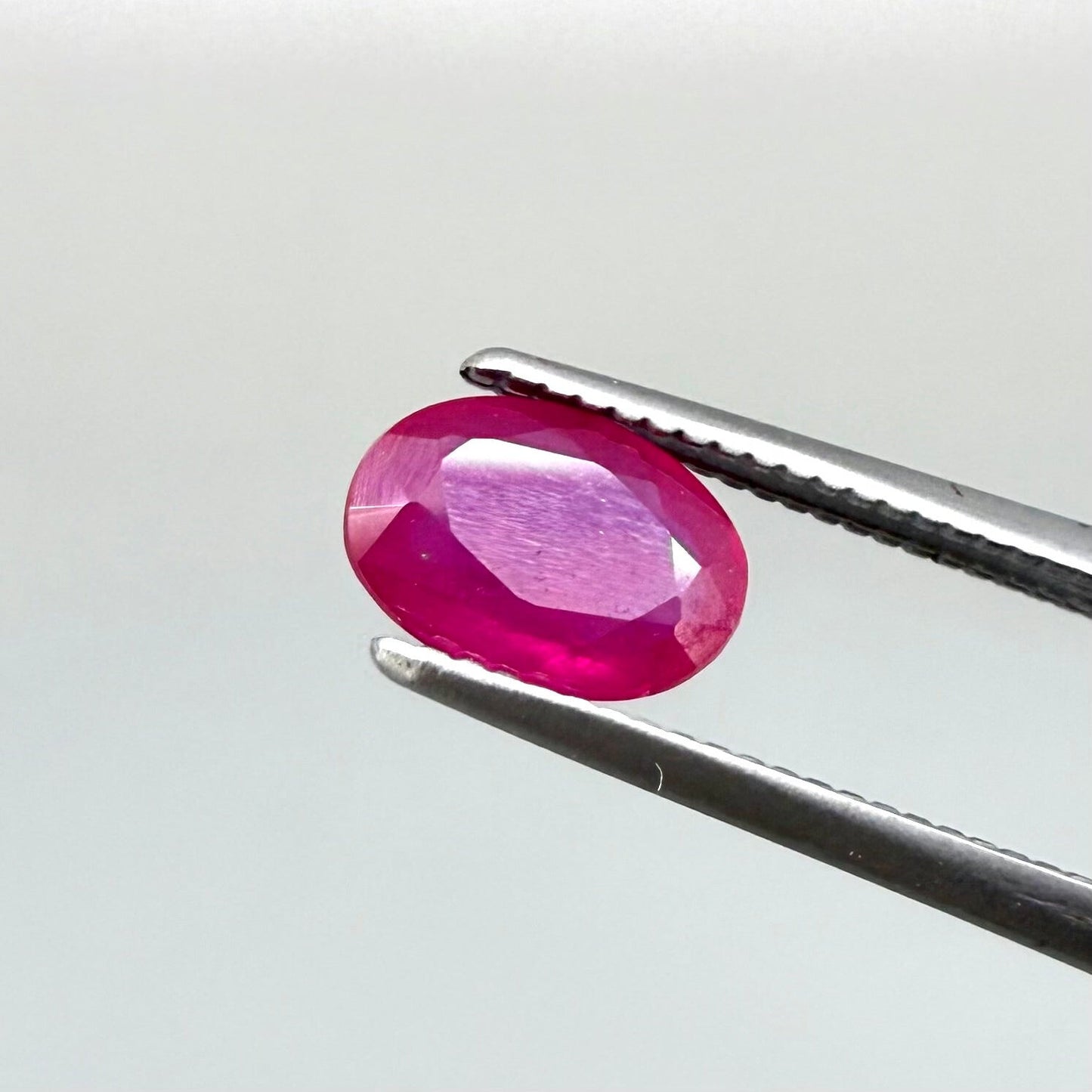0.87 ct natural pink-red Songea ruby, oval cut.
