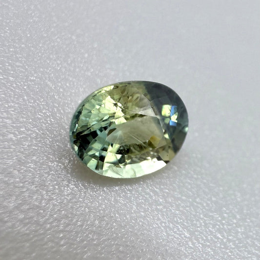 Bi-Color (Greenish-Blue Yellow) Sapphire Oval 0.78 Ct