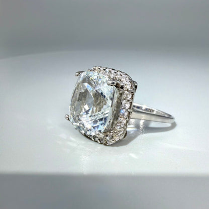 White gold plated silver ring with topaz