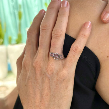 Three-stone amethyst ring in white gold plated sterling silver, featuring natural violet gemstones with soft lavender brilliance, elegant and feminine design.