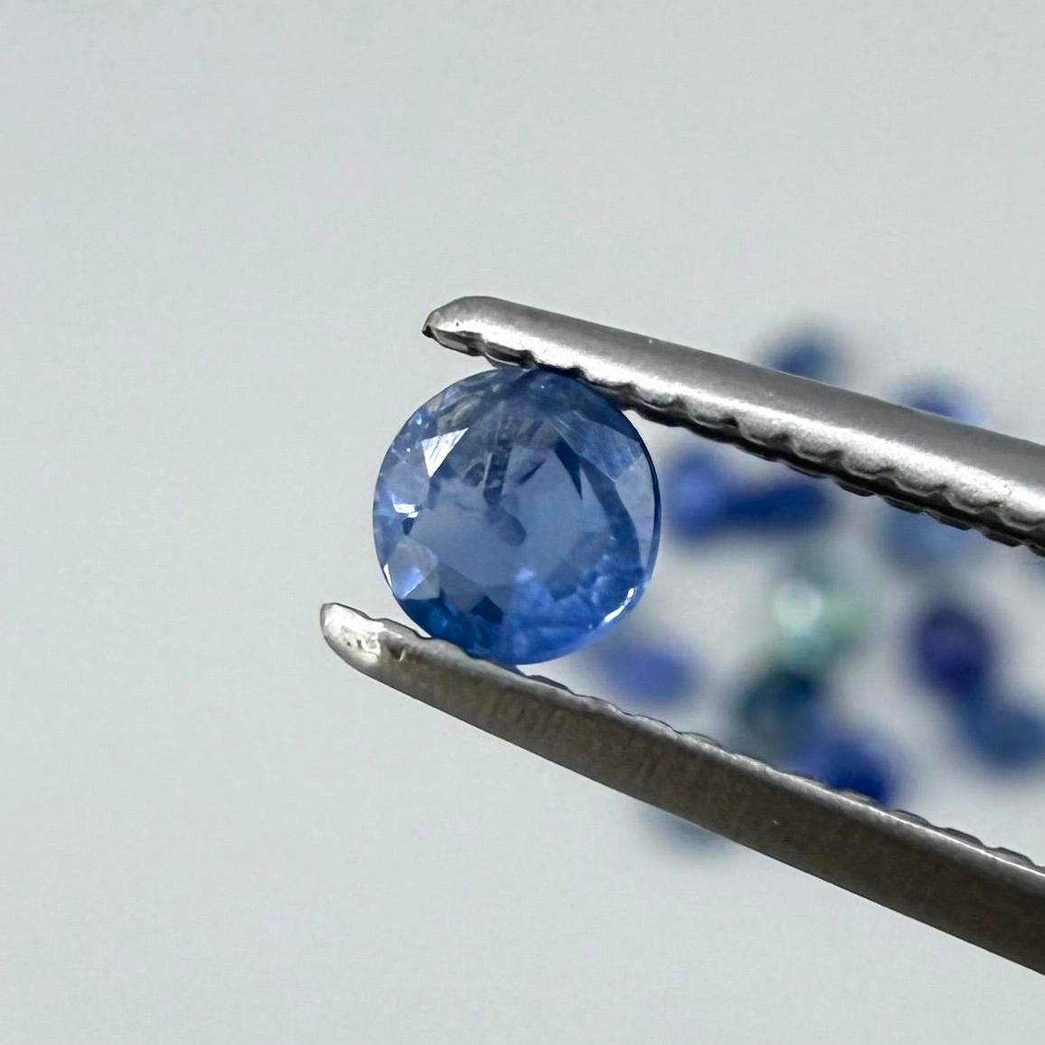 2.8 ct natural sapphire lot from Bangkaja with blue, green and purplish hues, round cut stones.