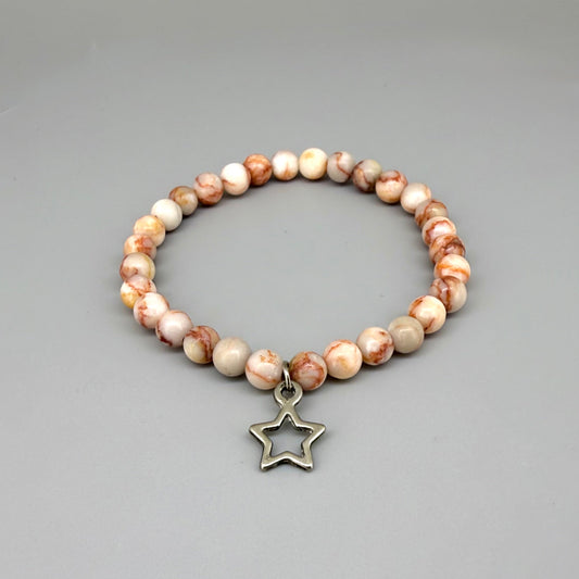 Orange-beige jasper beaded bracelet, 17cm, natural gemstone beads with star charm on elastic stretch band.