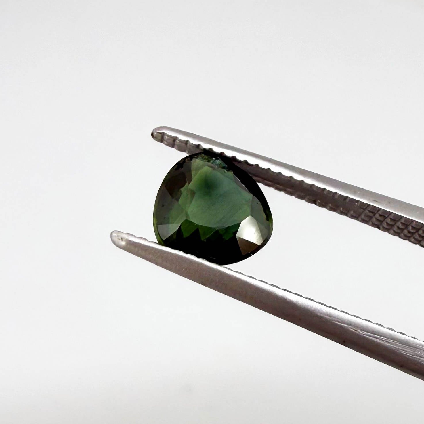 Natural Green Sapphire, trillion cut, heated, from Bangkaja Thailand