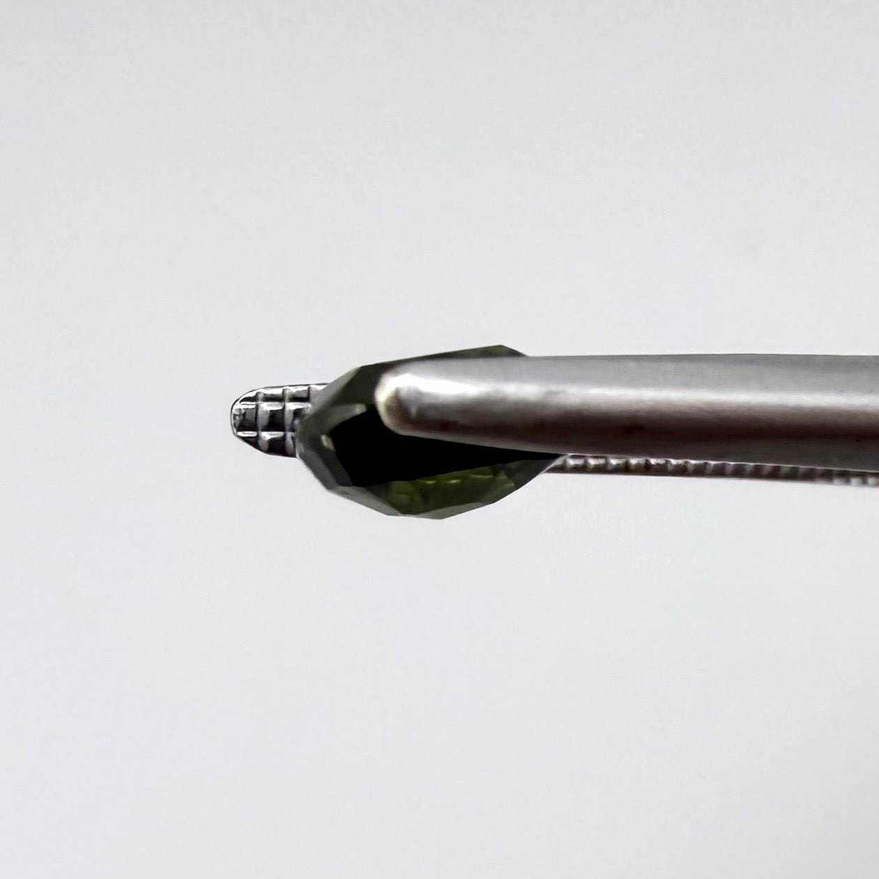 Natural Green Sapphire, trillion cut, heated, from Bangkaja ThailandNatural Green Sapphire, trillion cut, heated, from Bangkaja Thailand