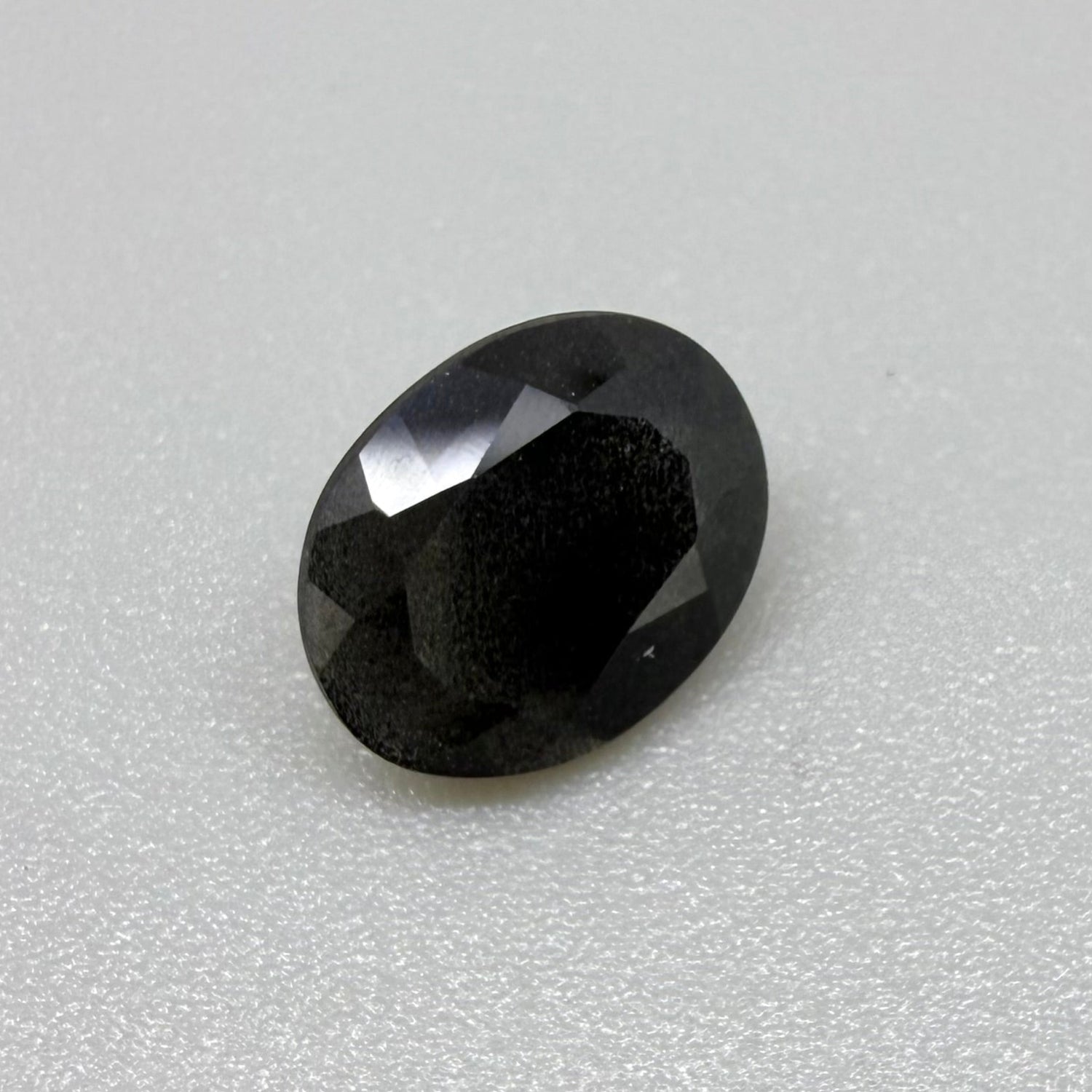 Natural Black Violet Scapolite gemstone, oval cut